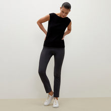 Front image of a woman standing wearing the foster pant in monsoon