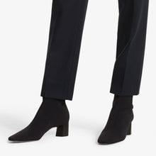 Woman standing wearing the Zelda boot.