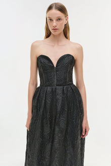 Black jacquard strapless bustier gown with sweetheart neckline and full skirt.