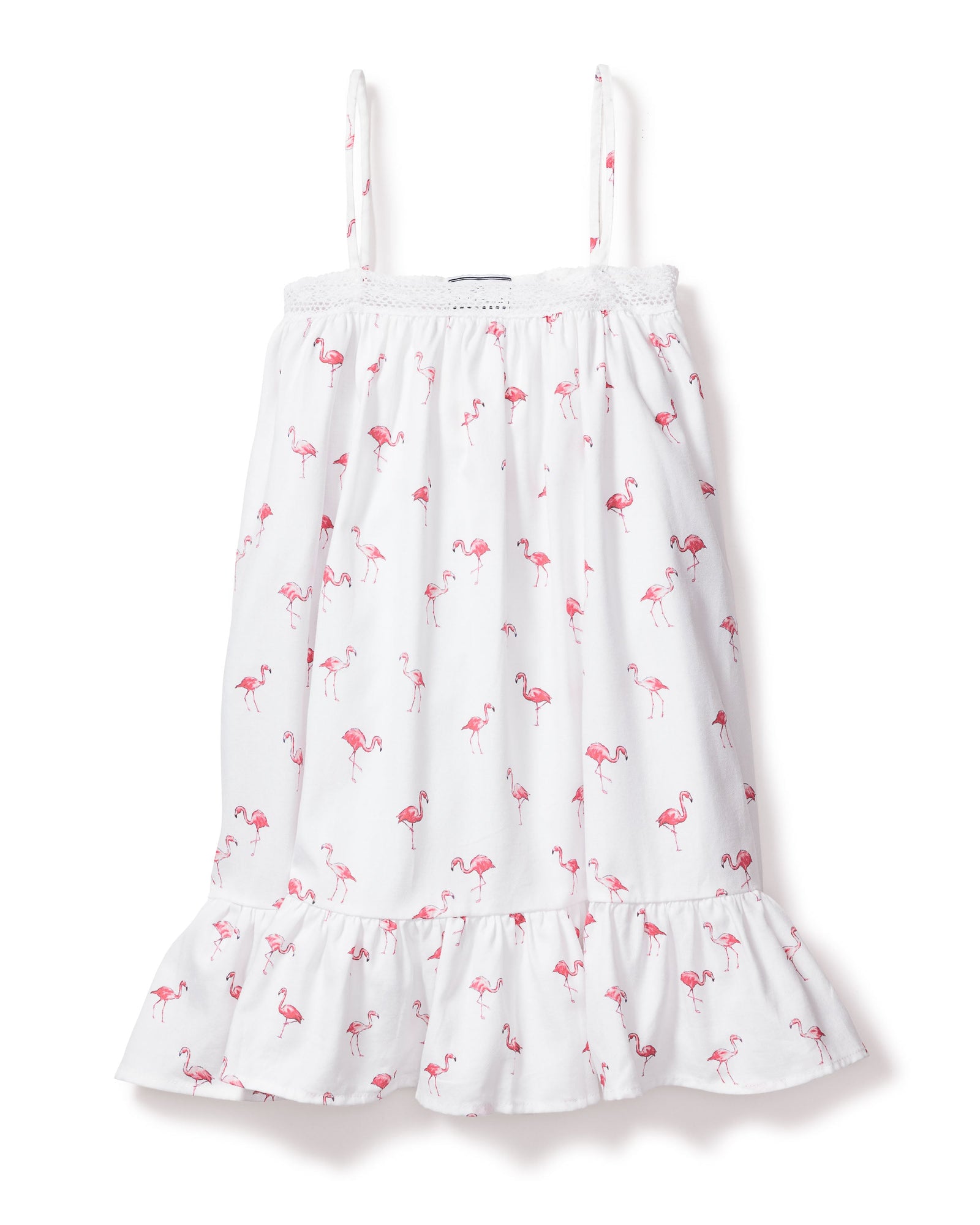 The Girls Twill Lily Nightgown in Flamingos by Petite Plume blends summer charm and cotton comfort. This white sundress features thin straps, a playful pink flamingo pattern, a ruffled hem, and a textured band near the neckline for a breezy yet cozy feel.