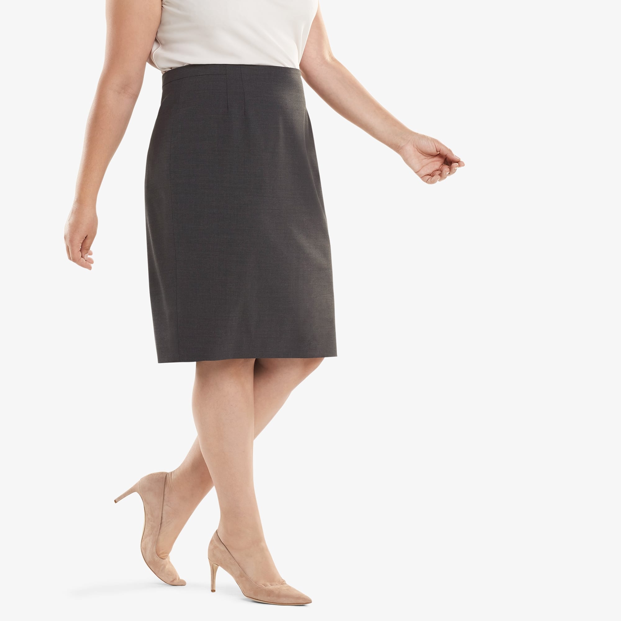 Side image of a woman standing wearing the Cobble Hill Skirt in Gray Melange | Exclude