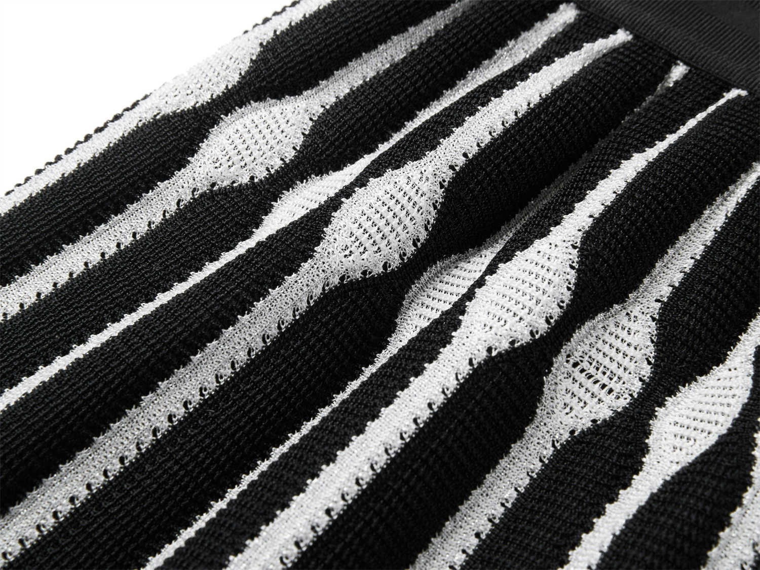Hollowed-out Embossed Texture Skirt | Black