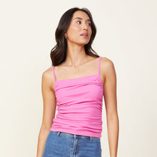 Front view of model wearing the rib shirred tank in raspberry rose.