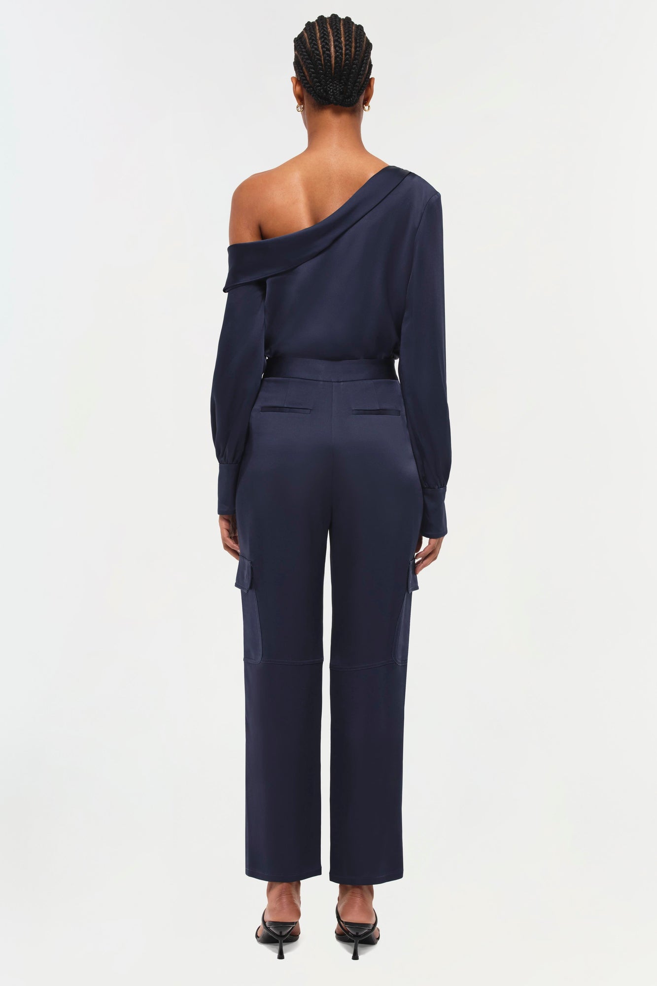 Navy Carolina Pant with high waist and cargo pockets, shown from back on model.