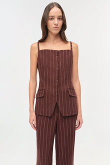 Burgundy pinstriped sleeveless top with square neckline, button front, and patch pockets.