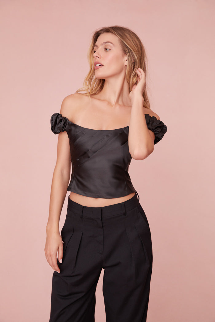 Off-the-shoulder top in luxe satin fabric.