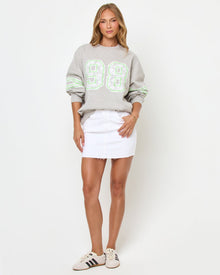 Front full-length studio view of the Legend Sweatshirt in Limeade highlighting the neon green 