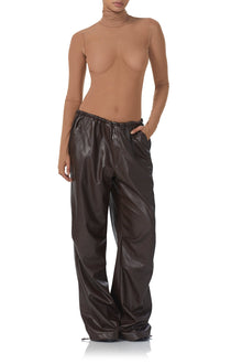 women's faux leather parachute style pant with adjustable hem details, and a oversized fit in java