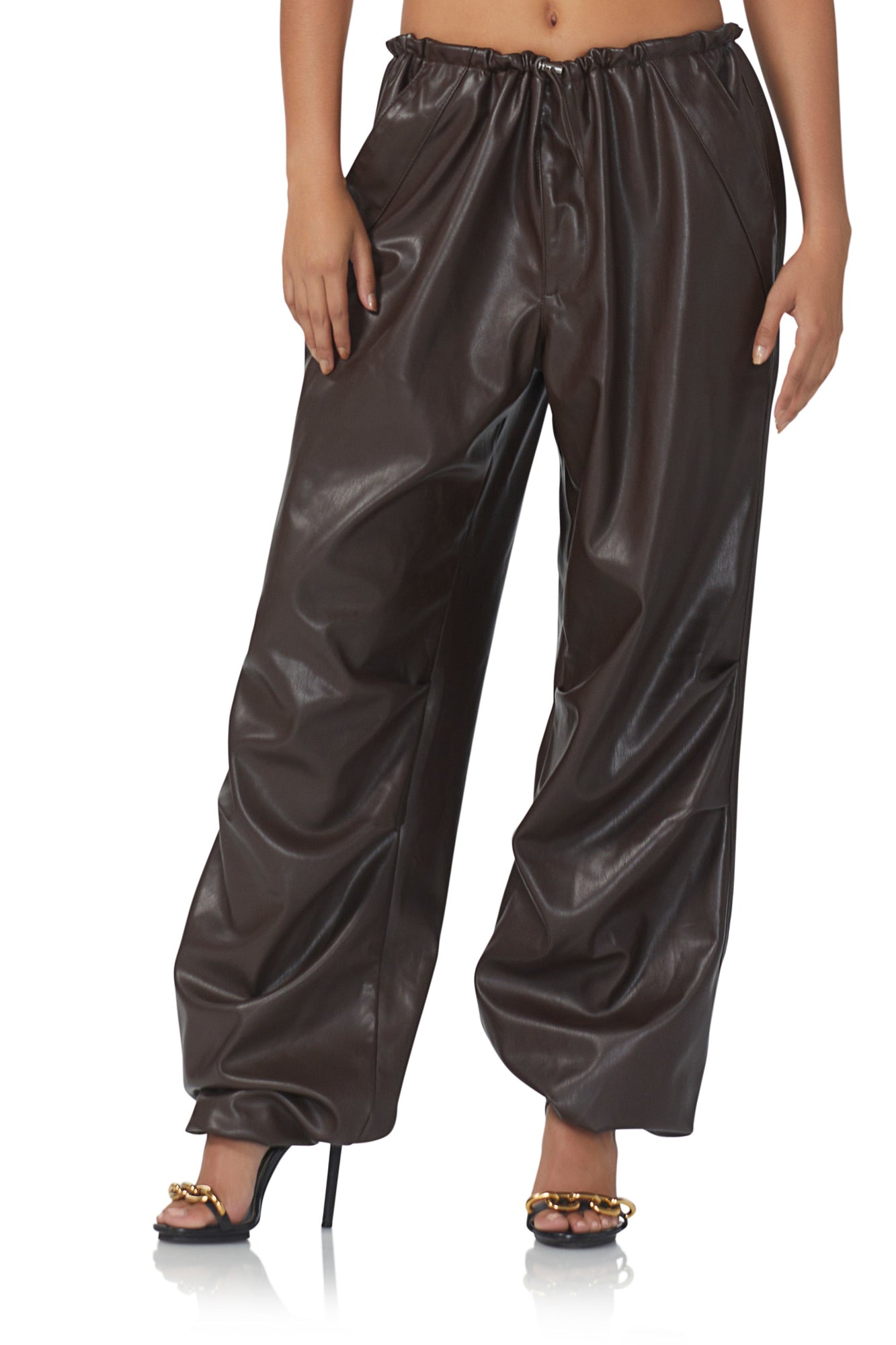 women's faux leather parachute style pant with adjustable hem details, and a oversized fit in java