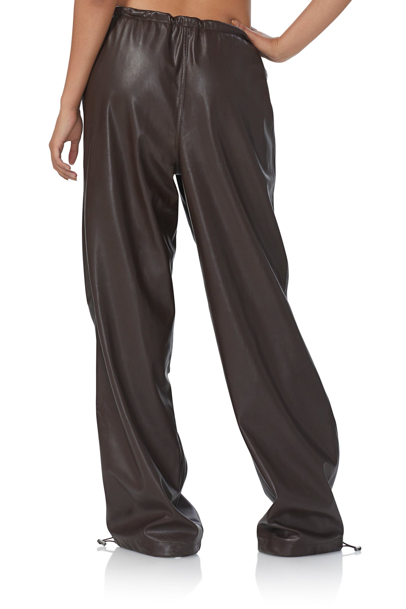 women's faux leather parachute style pant with adjustable hem details, and a oversized fit in java