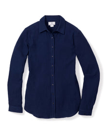 The Womens Gauze Morgan Top in Navy by Petite Plume is a cotton gauze, long-sleeved button-up with a textured finish and classic collar. Part of the luxury Gauze Collection, its elegantly displayed flat on a white background.