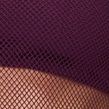 Close-up fabric swatch of the Zani Top in plum, showing the plum-colored ribbed textile texture.