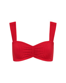 Red bikini top with thick straps on a white background