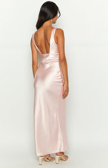 Close-up of the pink satin bow detail and teardrop cutout on the bodice of a maxi dress