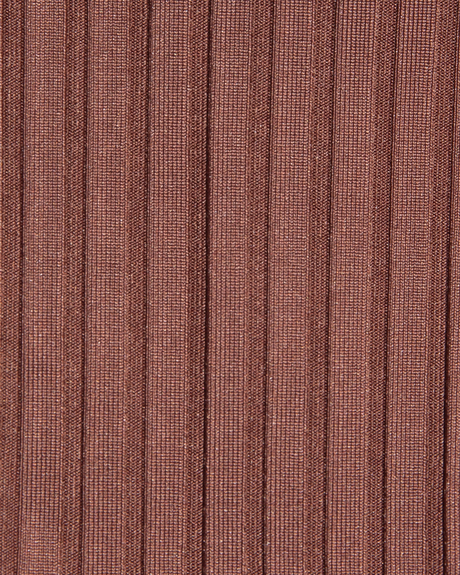 Close-up of a textured brown fabric surface