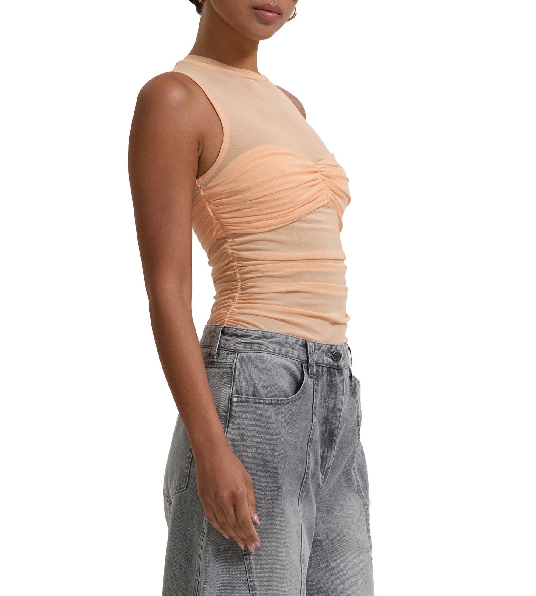 women's sleeveless top with illusion bandeau detail in peach fuzz