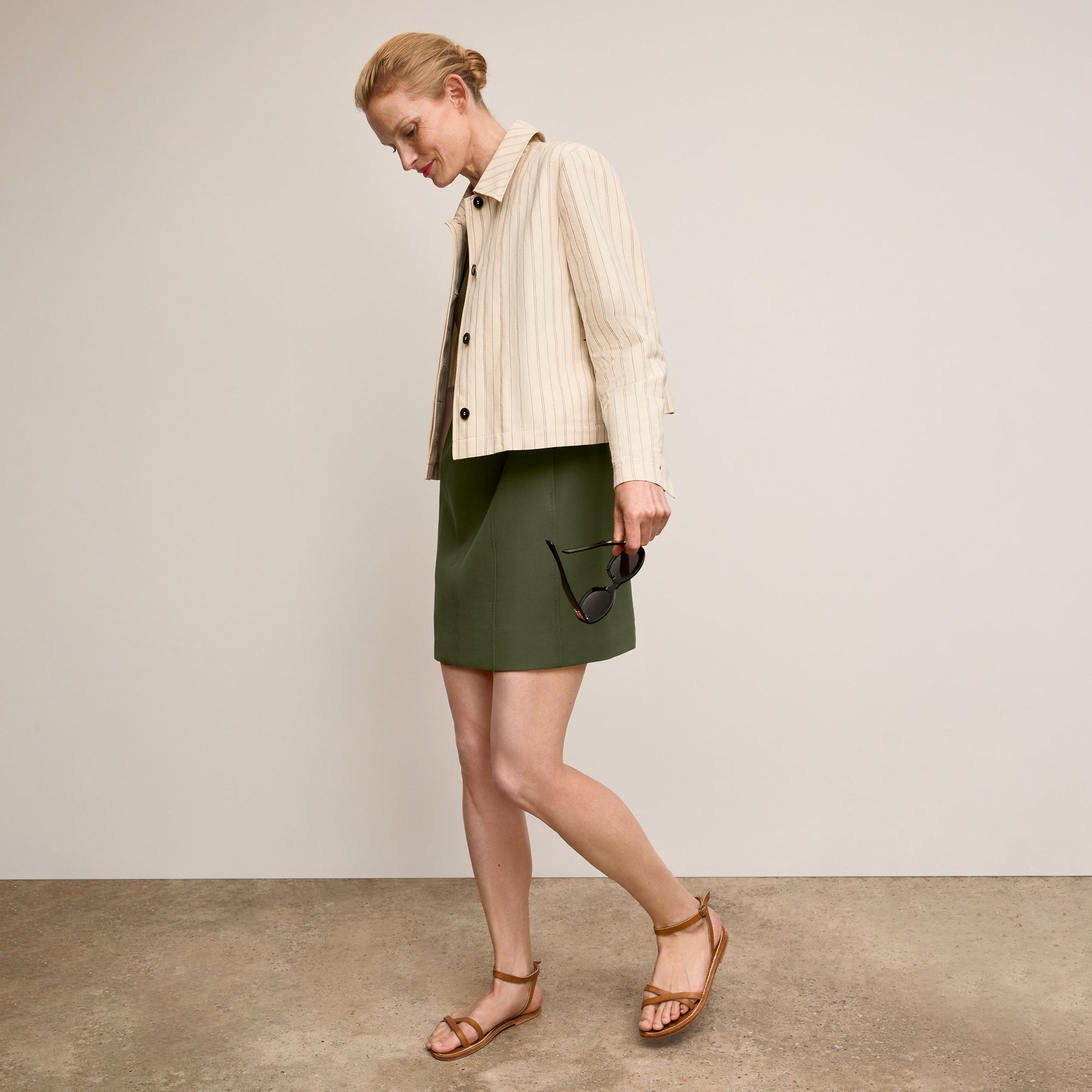 front image of a woman wearing the nicky jacket in linen stripe | Exclude