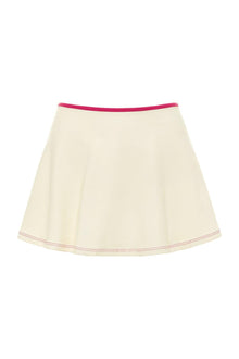 Cream ballet skirt with raspberry pink waistband and matching topstitching at hem.