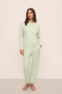 Model is wearing French Terry Jogger in Matcha