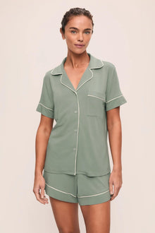 Model is wearing Gisele TENCEL Modal Relaxed Short PJ Set in Eucalyptus/Ivory
