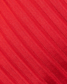 Close-up of red fabric with a textured pattern