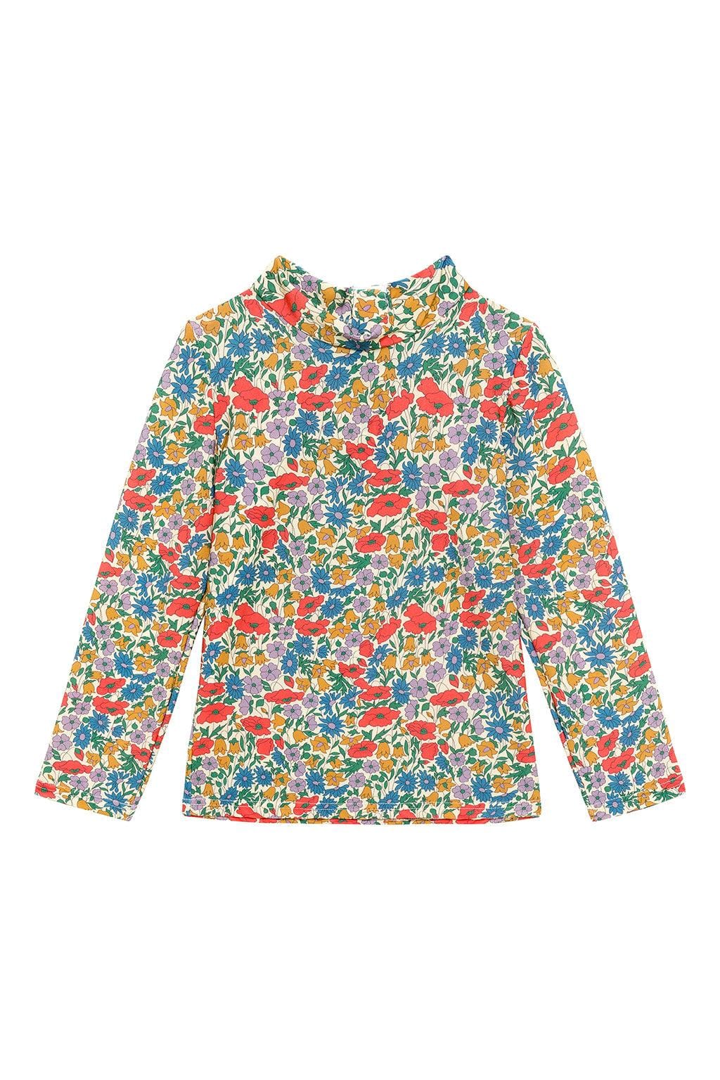 Long-sleeve rashguard with multicolored floral print in red, yellow, blue, purple, and green throughout.