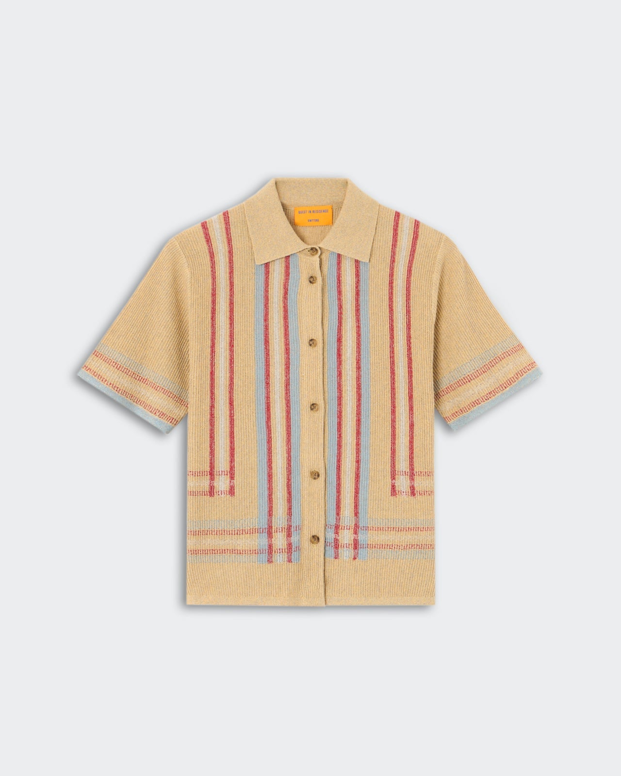 Havana Shirt - Sandstone Combo, a short-sleeve knit shirt in warm beige with vertical and horizontal woven stripes in red and light blue, featuring a classic collar and brown buttons down the front, displayed flat.