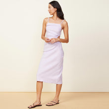 Front view of model wearing the linen slip dress in wisteria.