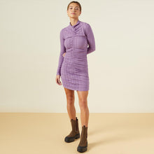 Front view of model wearing the flat rib mock shirred dress in aster purple.