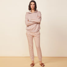 Front view of model wearing the supersoft fleece slouchy pullover in taupe.