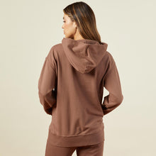 Back view of model wearing the 90's classic hoody in dusty cocoa.