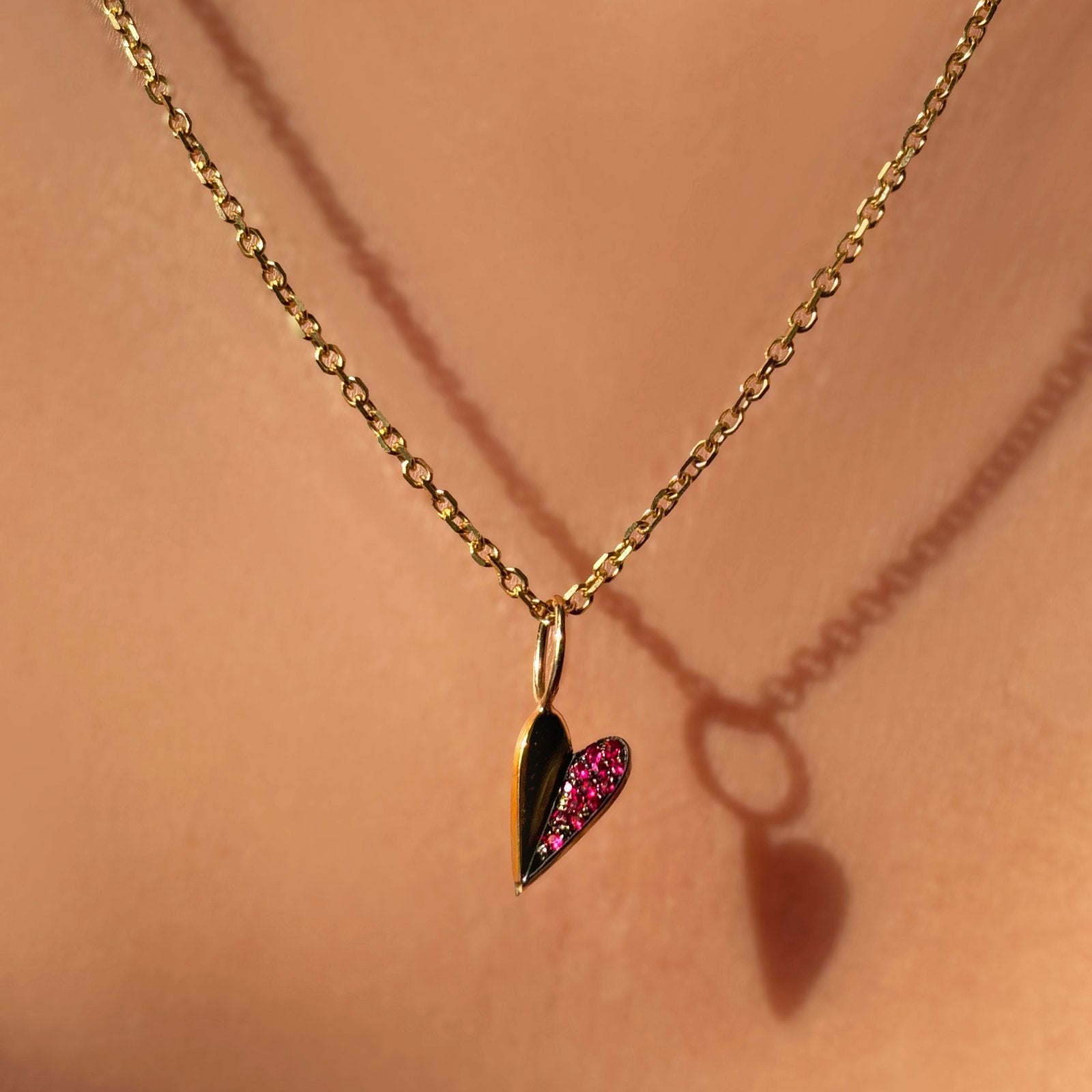 Folded Heart Charm with Ruby styled on a Adjustable Diamond Cut Cable Chain
