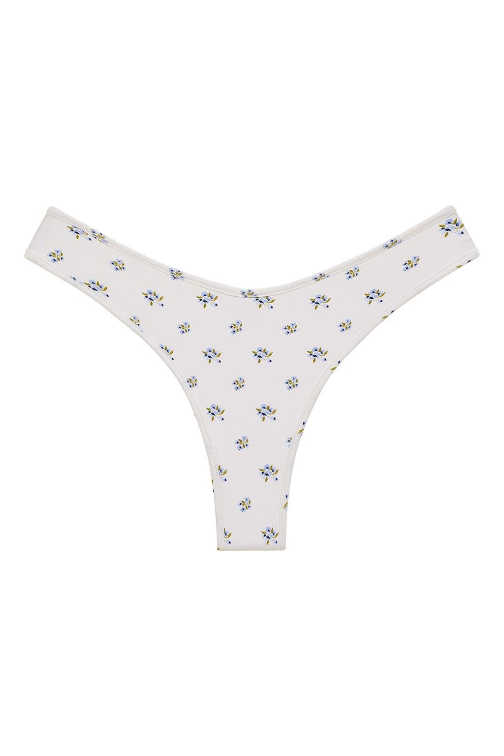 White bikini bottom with small blue and yellow floral print throughout.