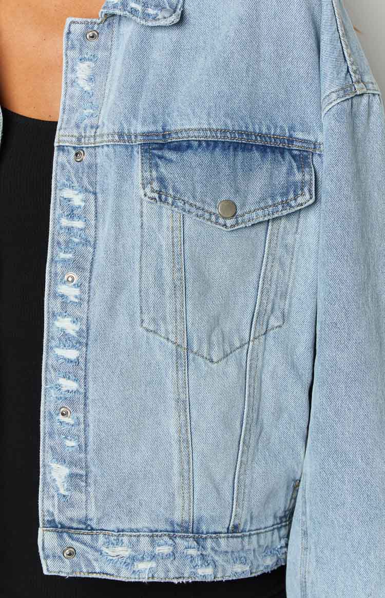 light wash oversized denim jacket with silver buttons 