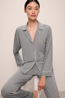 Model wears Gisele TENCELâ„¢ Modal Long PJ Set in moonlight/ivory.