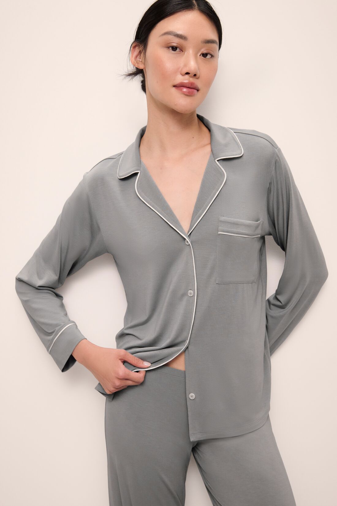 Model wears Gisele TENCELâ„¢ Modal Long PJ Set in moonlight/ivory.