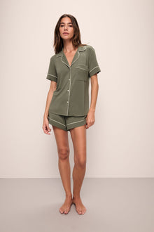 Model is Gisele TENCELâ„¢ Modal Relaxed Short PJ Set in moss/ivory.