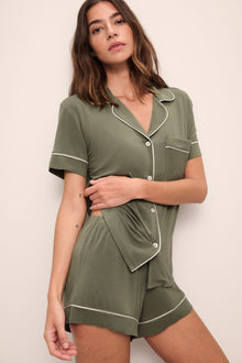 Model is Gisele TENCELâ„¢ Modal Relaxed Short PJ Set in moss/ivory.