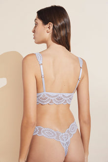Model wears Mariana Bralette in Ice Blue.