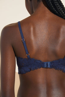 Model wears Rosalia TENCELâ„¢ Modal Bralette in Navy.