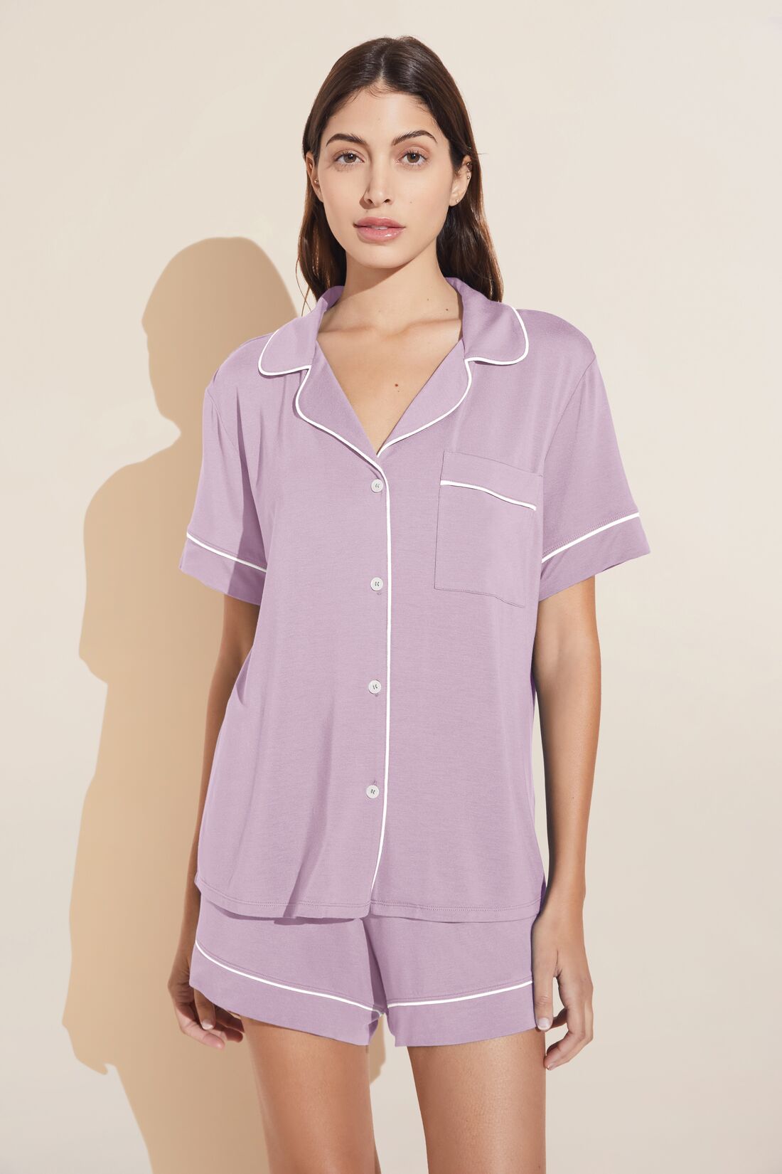 Model wears Gisele TENCELâ„¢ Modal Relaxed Short PJ Set in lavender/ivory.