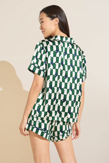 Model wears Inez Washable Silk Printed Short PJ Set in Mosaic Tile Forest Green/Navy.
