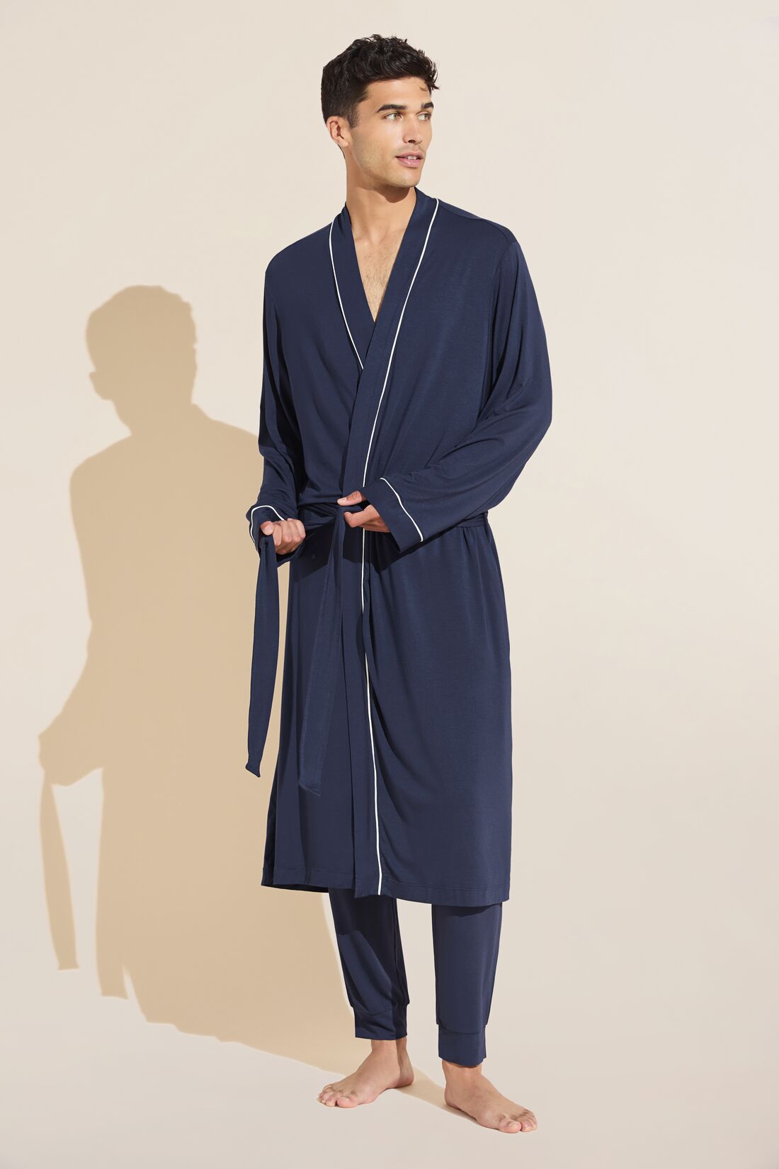 Model wears William TENCEL Modal Robe in True Navy/Ivory.