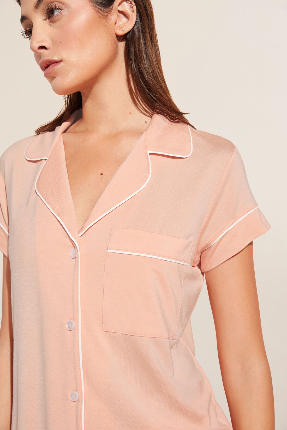 Model wears Model wears Gisele TENCELâ„¢ Modal Shortie Short PJ Set in peach parfait/ivory.