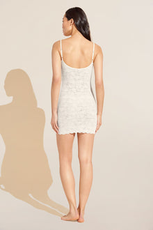 Model wears Soft Stretch Recycled Lace Slip in Ivory.