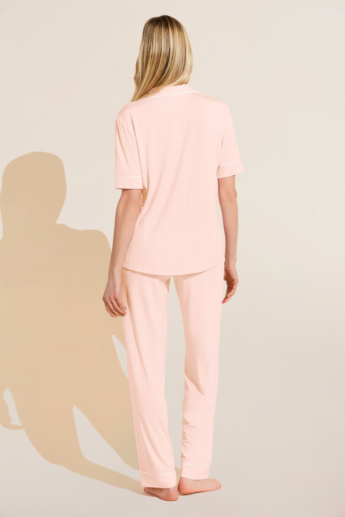 Model wears Gisele TENCELâ„¢ Modal Short Sleeve & Pant PJ Set in petal pink/ivory.