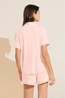 Model wears Gisele TENCELâ„¢ Modal Relaxed Short PJ Set in petal pink/ivory.