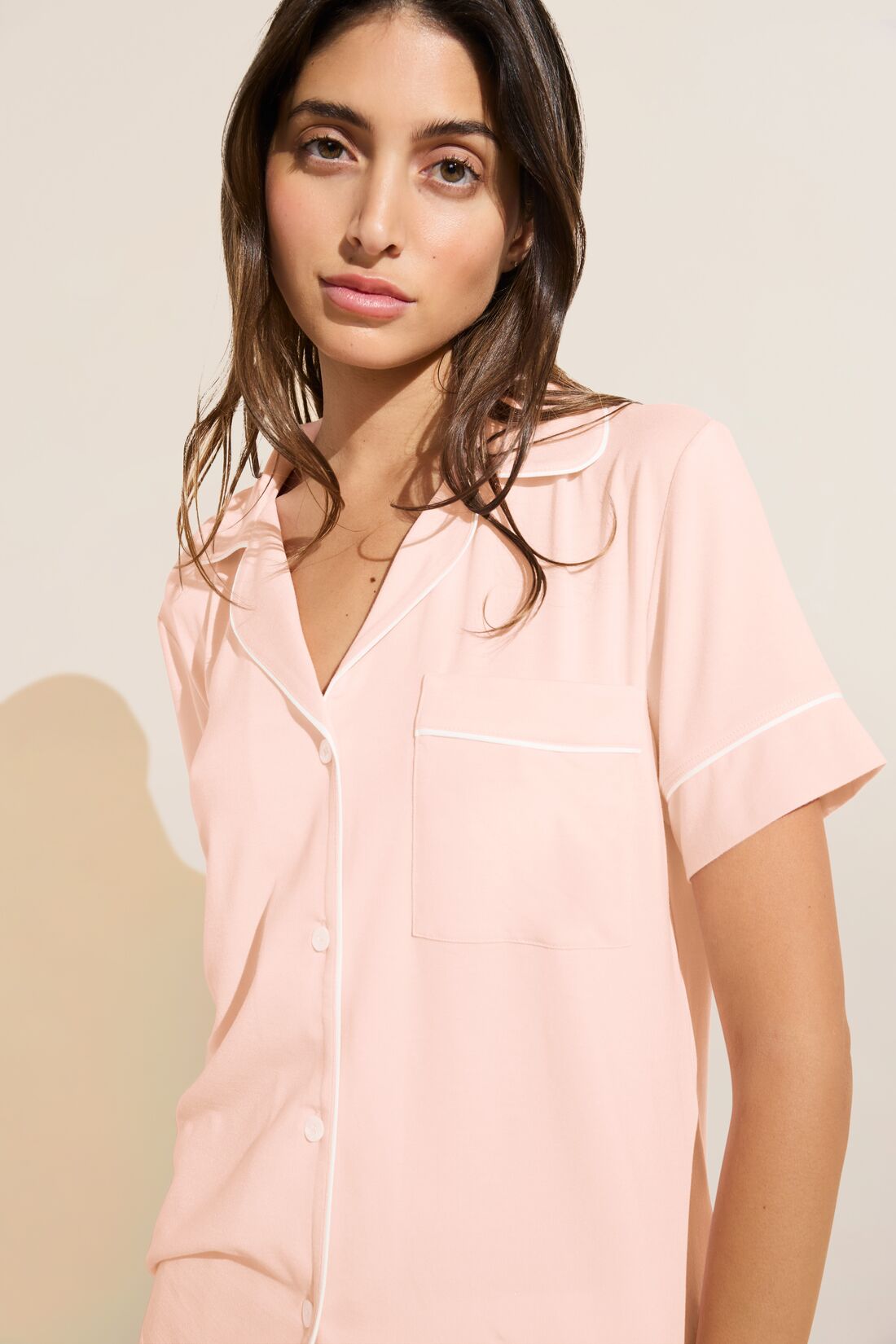 Model wears Gisele TENCELâ„¢ Modal Relaxed Short PJ Set in petal pink/ivory.