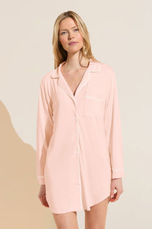 Model wears Gisele TENCELâ„¢ Modal Sleepshirt in petal pink/ivory.