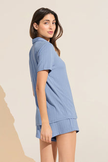 Model wears Gisele TENCELâ„¢ Modal Rib Relaxed Short PJ Set in wedgewood blue.